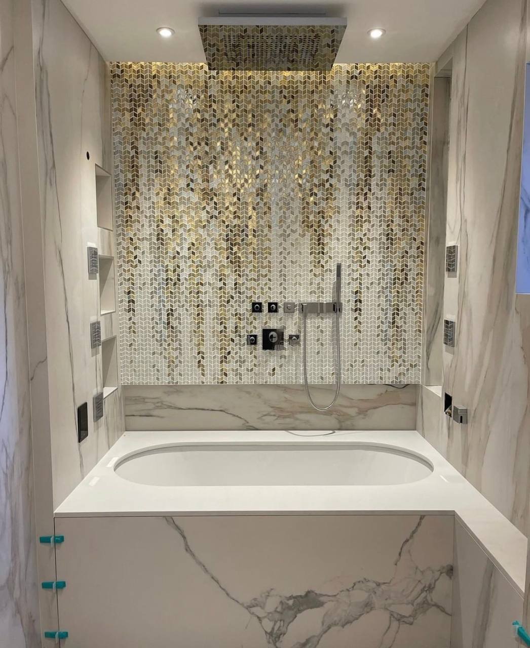 Luxury marble bathroom with mosaic feature wall in South West London