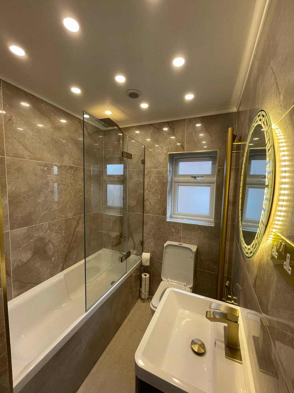 Designer bathroom layout with luxury fittings in South West London