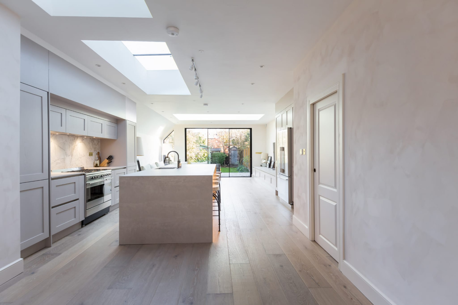Full house refurbishment with open-plan kitchen extension, skylights and new heating by Maxfix in Richmond